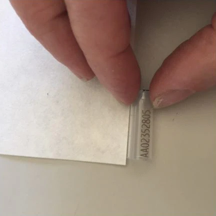 Individual tubes have both and alphanumeric and a QR code